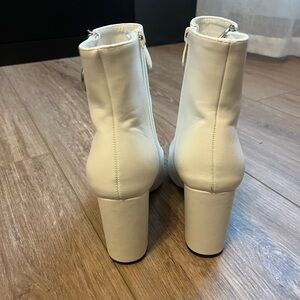 White heeled boots